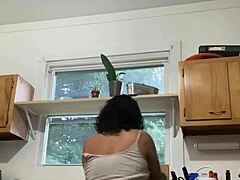 Latina mature woman enjoying household chores